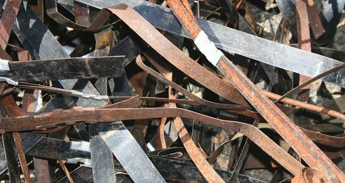 a mess of steel banding before being fed through a sweed scrap chopper